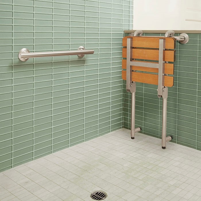 Wall-Mounted Folding Shower Seat Against Vertical Stack Tile