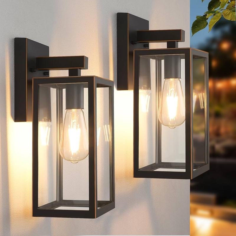 Wall Sconce with Warm Bronze Accents and Clear Glass Lantern Frame