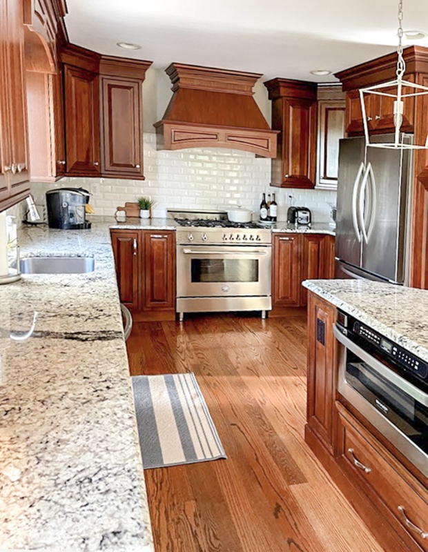 Warm Wood Kitchen Update with Wood Vent Hood & Subway Tile