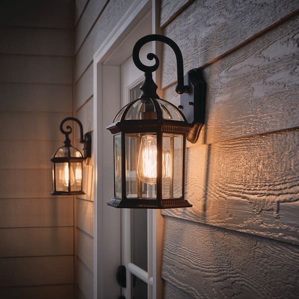 Weathered Bronze Outdoor Wall Light featuring Scroll Arm Design