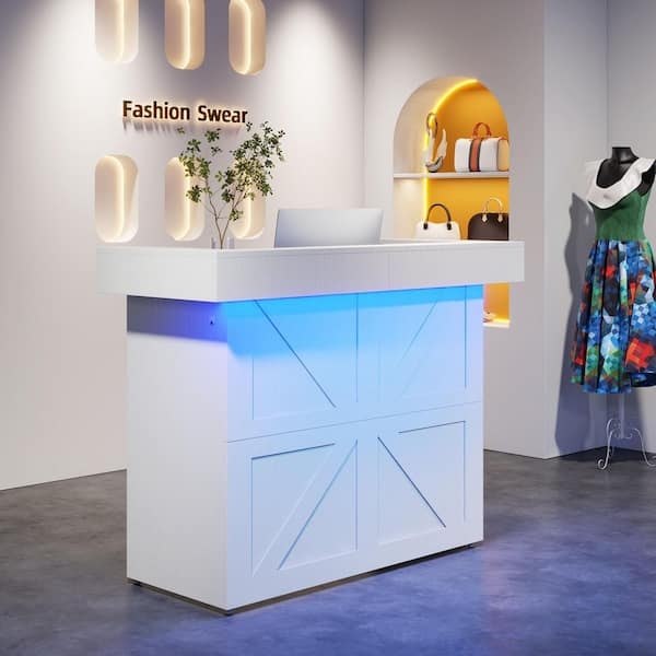 White Reception Desk with X-Brace Panels and Blue LED Glow