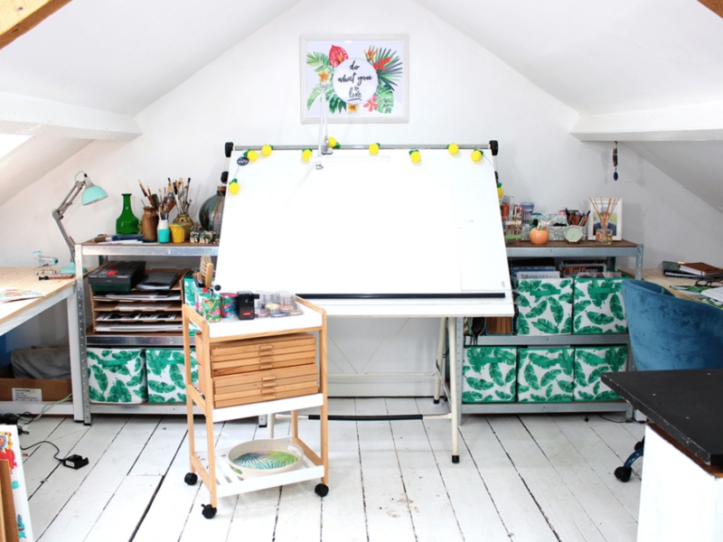 White Rolling Drafting Table with Tilting Surface and Teal Accents