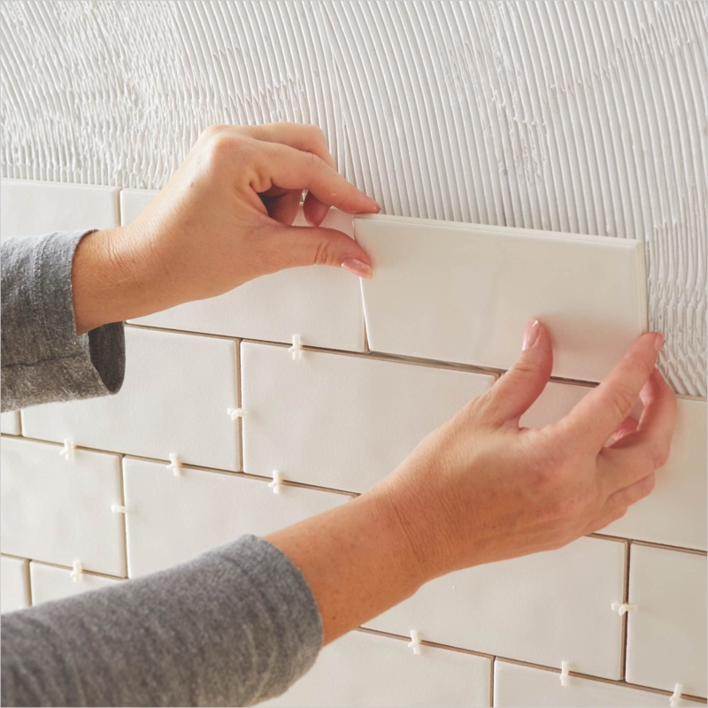 White Subway Tile Installation with Running Bond Pattern and Spacers