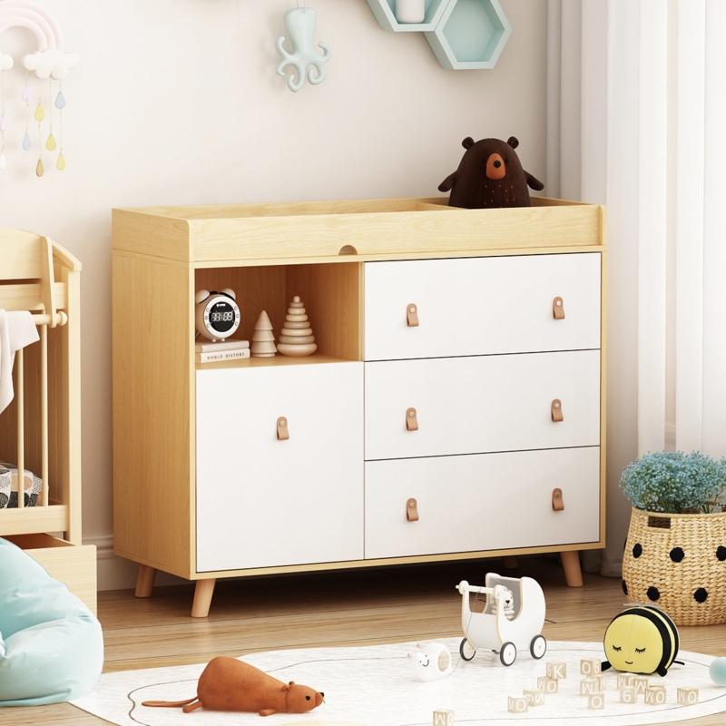 Wood and White Nursery Dresser with Leather Tab Pulls and Tapered Legs.