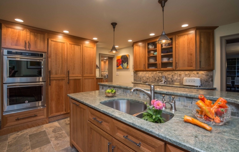 Wood Cabinetry with Green Granite & Multi Level Island
