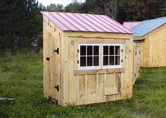 Wooden Chicken Coop, Red Metal Roof & Board and Batten Siding