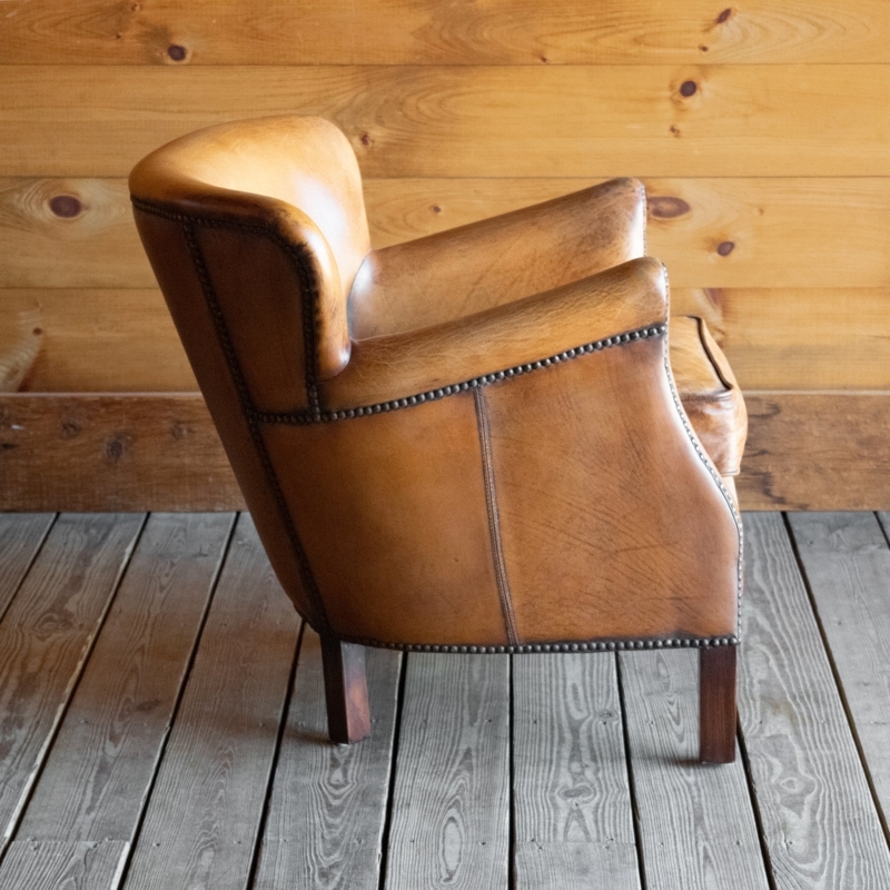 Accent Chair: Rustic Leather Wingback, Sloped Arms. Nailhead Trim Seating.