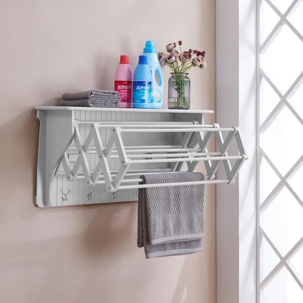 Accordion Drying Rack: White Wall Mounted with Beadboard Backing Feature.