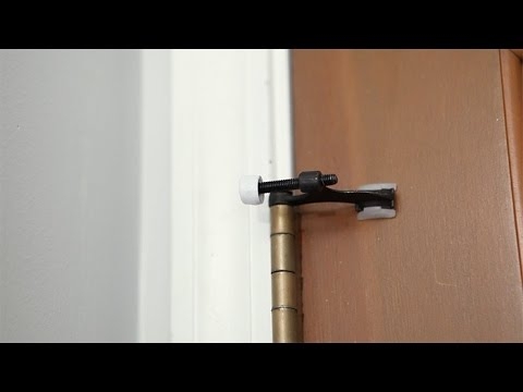 Antique Brass Hinge Pin Stop, Matte Black Protective Pad