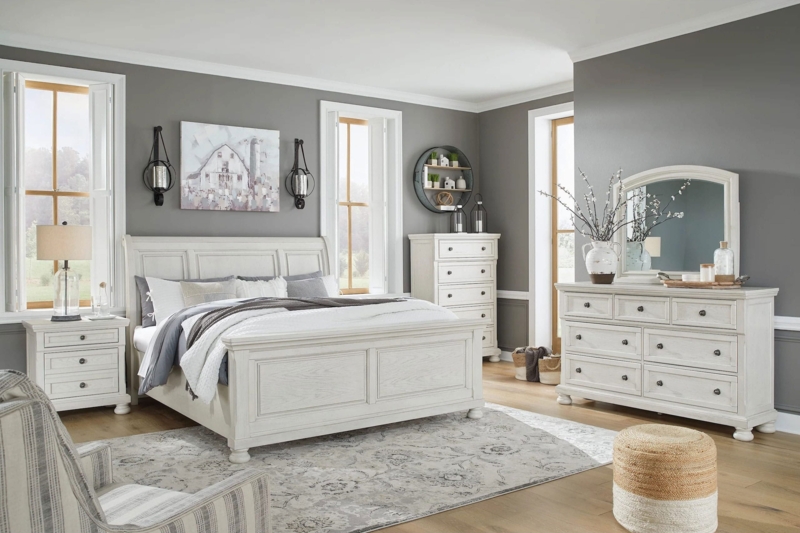 Antique White Sleigh Bedroom Set with Distressed Finish and Bun Feet