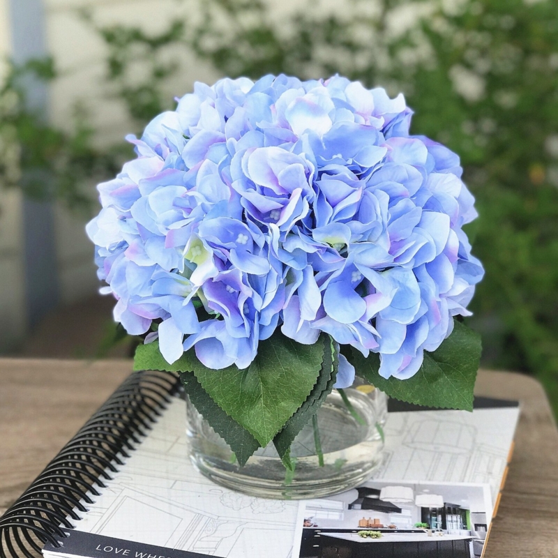 Artificial Flowers with Faux Water in Periwinkle Blue Low Profile Vase