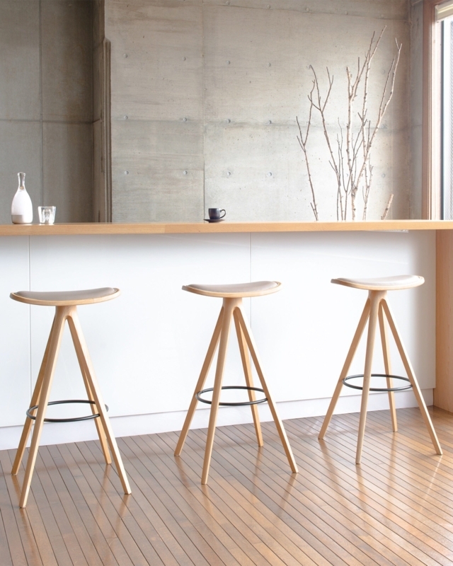 Bar Stool backless design with saddle seat and circular footrest