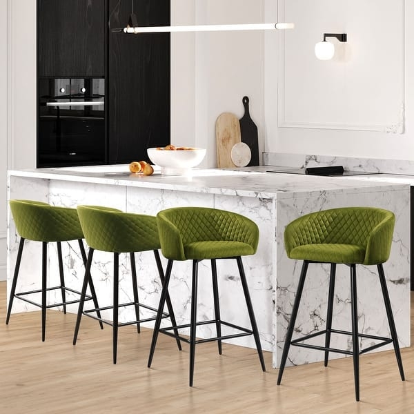 Bar Stool: Moss green velvet, diamond quilted back and black metal legs.