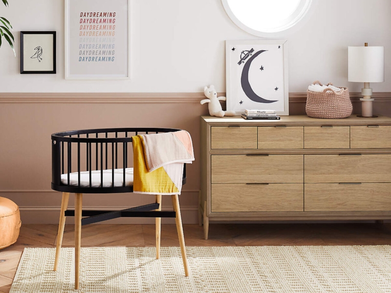 Bassinet Mid-Century Matte Black Frame Oval Silhouette Splayed Wood Legs