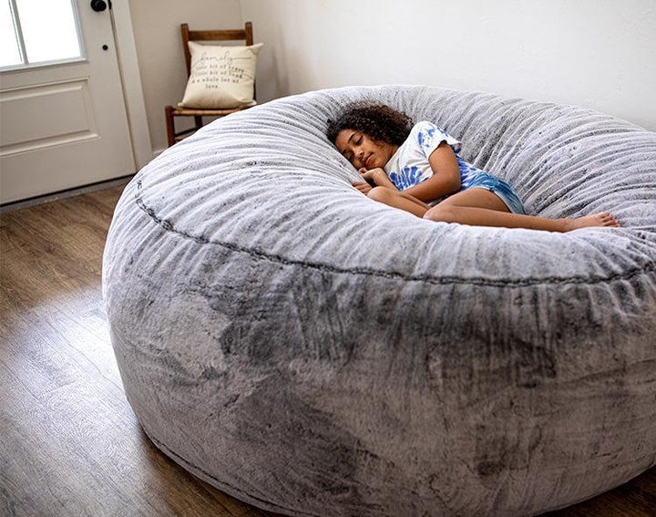 Bean Bag Chair: Charcoal Grey Plush Faux Fur, Casual Round Profile.