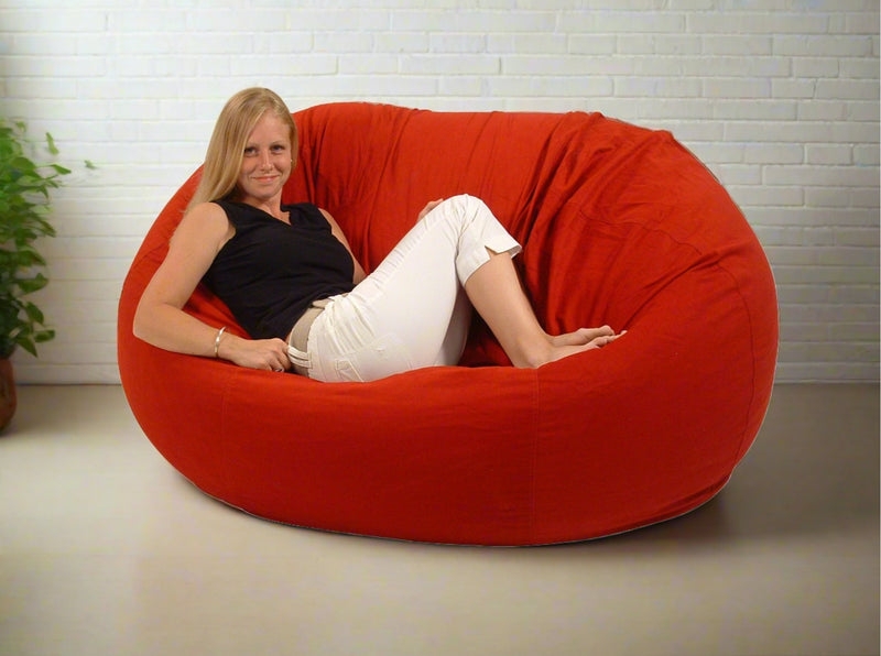 Bean Bag Loveseat: Vibrant Red Woven Textile, Slouchy Silhouette.