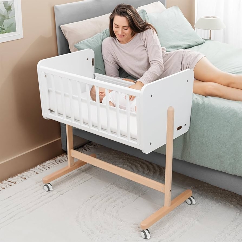 Bedside Bassinet White Wooden Slatted Sides H-Frame Base Swivel Casters