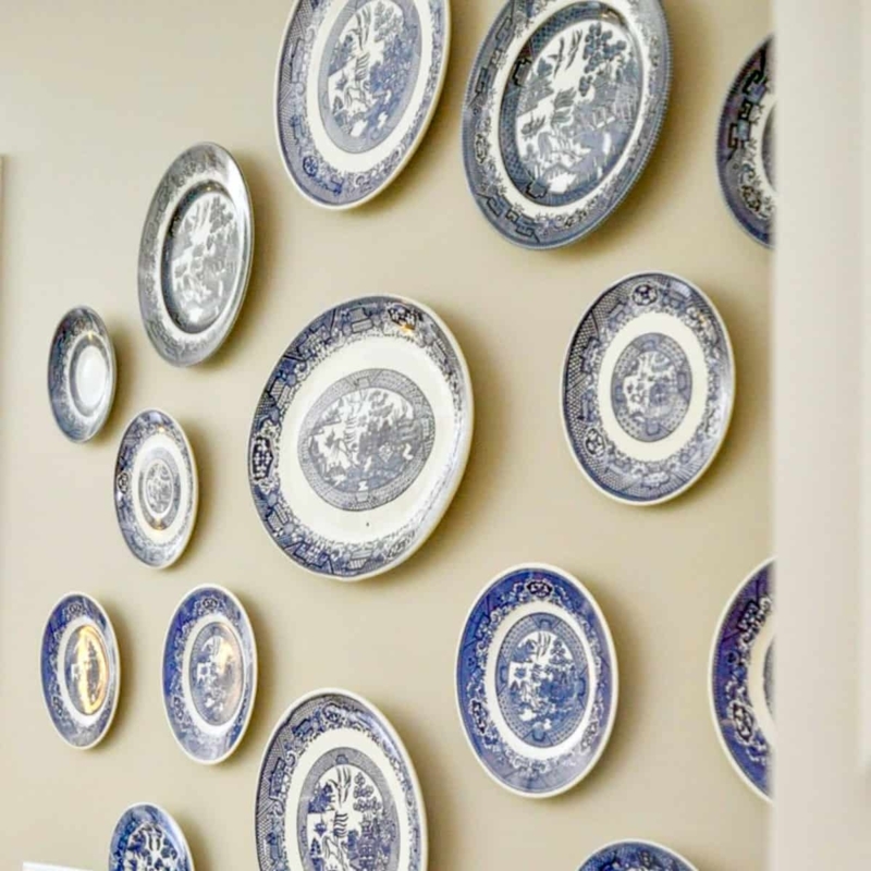 Blue Willow Wall Gallery with Clustered Arrangement and Varied Sizes