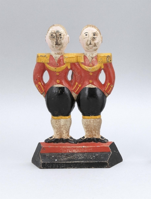 Cast Iron Doorstop Twin Footmen Marked Fish Pedestal Stand