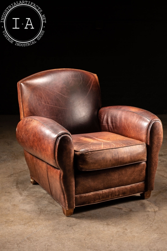 Club Chair: Aged Leather, Deep Profile. Art Deco Industrial Library Seating.
