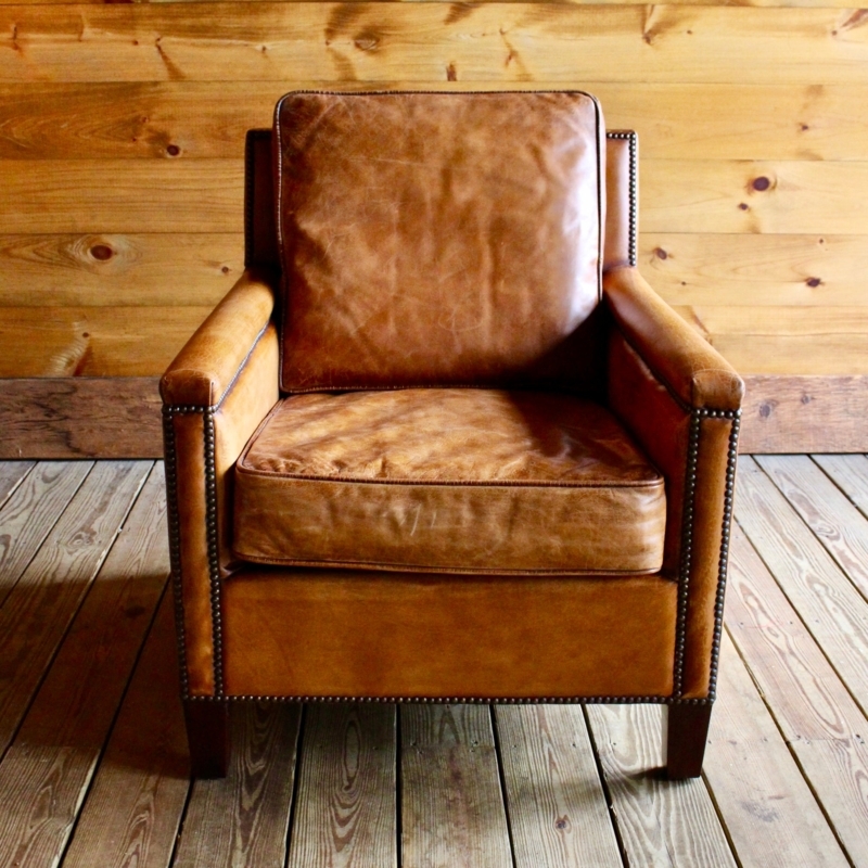 Club Chair: Distressed Leather, Boxy Silhouette. Rustic Lodge Seating.