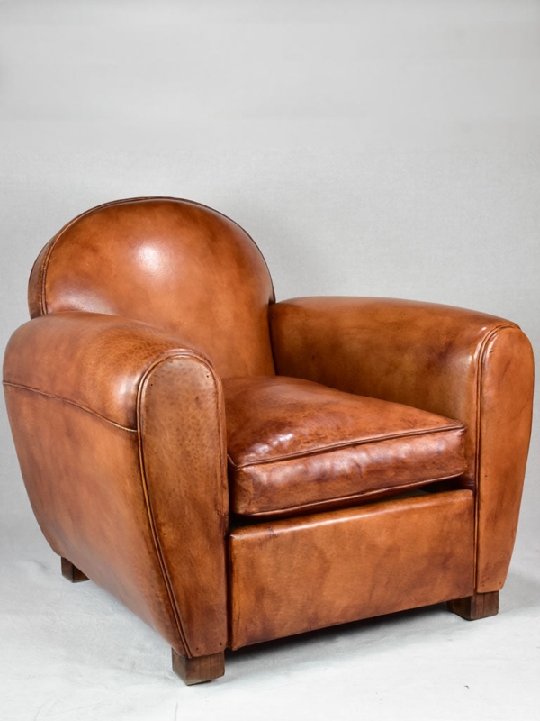 Club Chair: Patinated Leather, Mustache Back. French Art Deco Armchair.