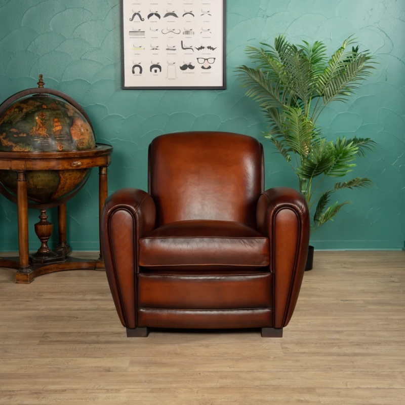 Club Chair: Rounded Silhouette, Curved Roll Arms. Retro Gentleman's Study.
