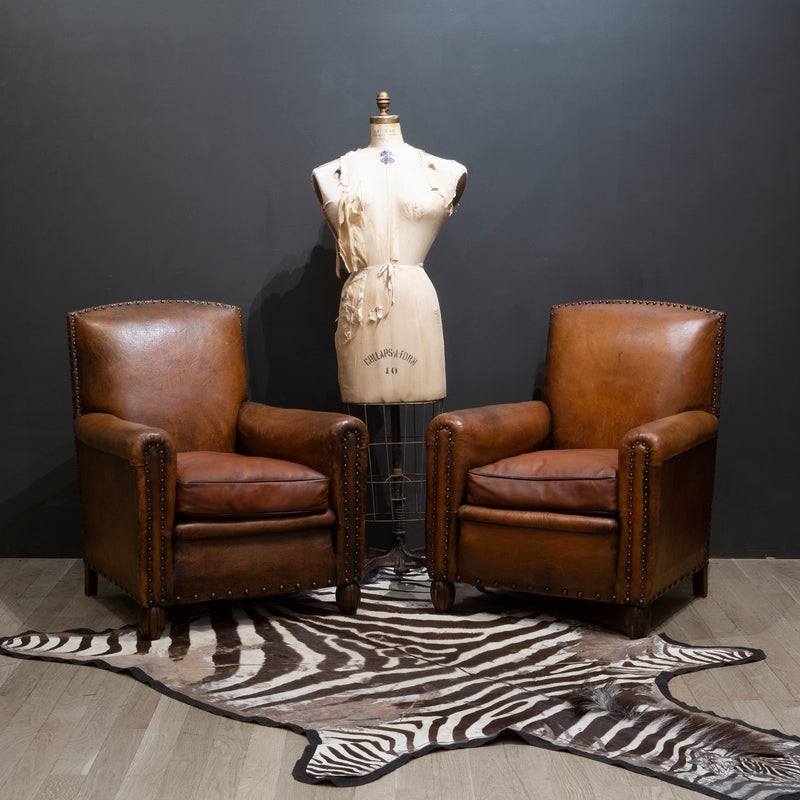 Club Chairs: Aged Leather Patina, Bun Feet. 1930s Vintage Lounge Seating.