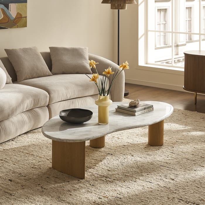 Coffee Table featuring Kidney Shaped Stone Top & Organic Silhouette