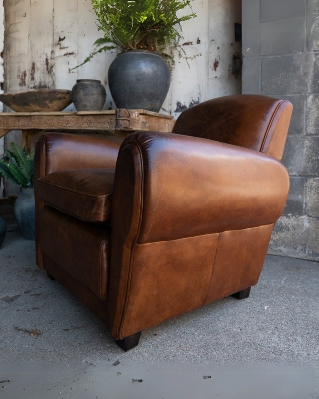 Compact Club Chair: Cognac Leather, Curved Back. Vintage Style Seating.