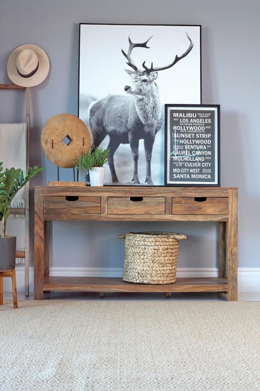 Console Table: Sheesham Wood Grain, Three Drawers, Cutout Handles.