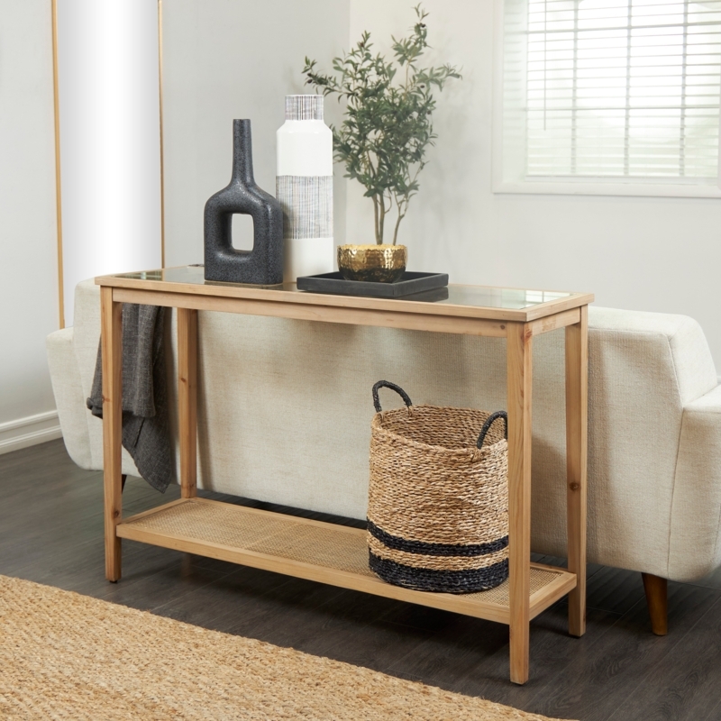 Console Table: Slim Profile, Glass Top and Woven Rattan Shelf.