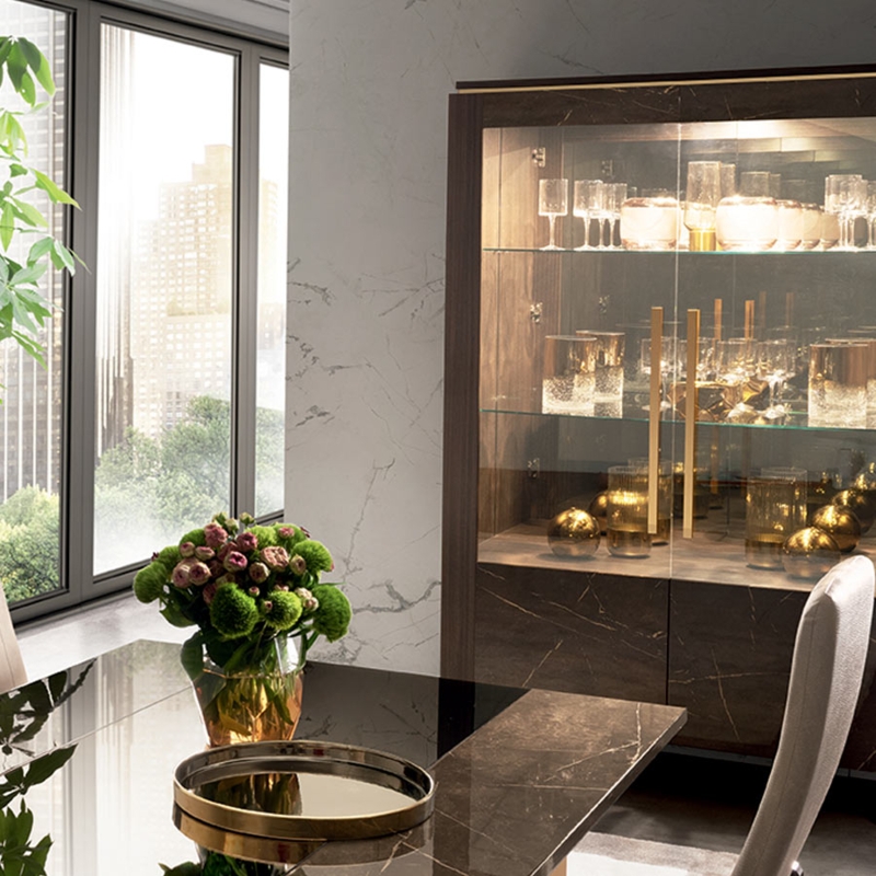 Contemporary Dining Storage with Marble Veined Doors and Gold Handles