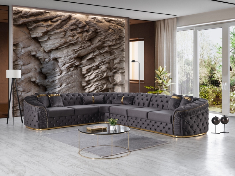Curved Sectional with Diamond Tufting and Polished Gold Plinth Base