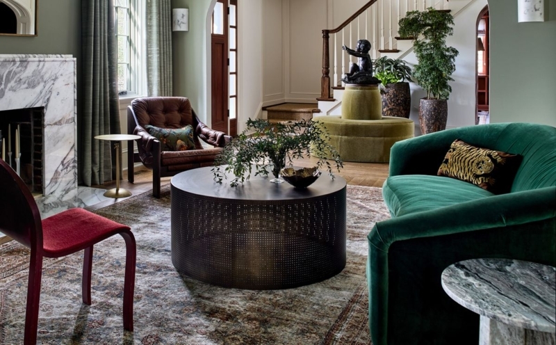 Curved Sofa Emerald Velvet Perforated Metal Table Maximalist Style