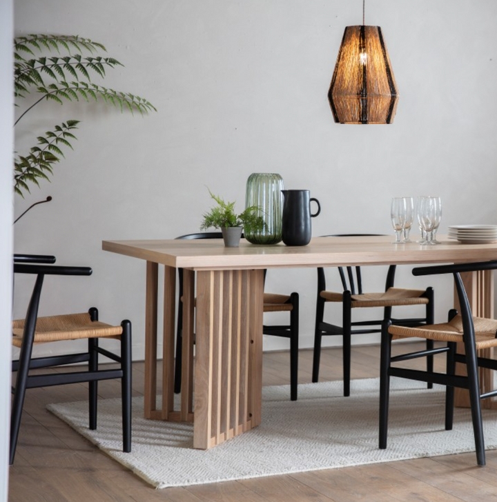 Dining Set featuring Black Wishbone Chairs and Slatted Wood Base Table