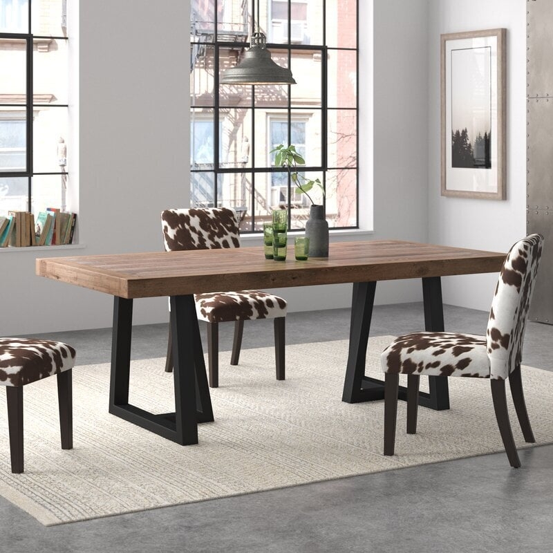 Dining Table Black Trapezoid Legs Distressed Top Cowhide Pattern