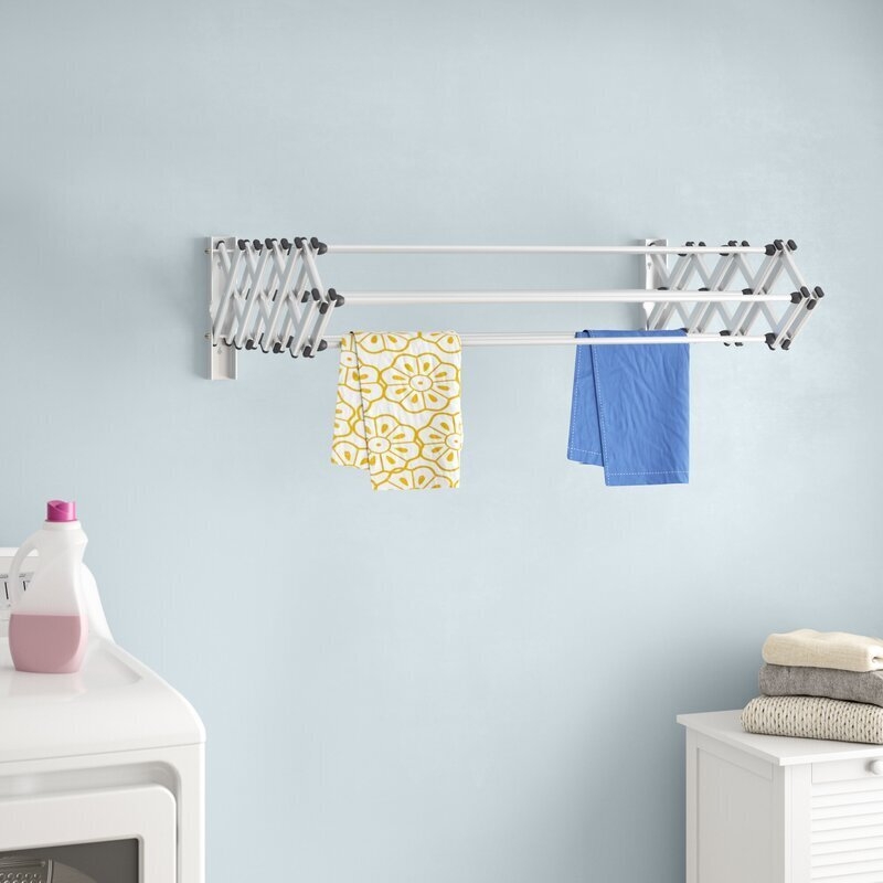 Drying Rack: White Powder Coated Metal Wall Mounted Accordion Extension.