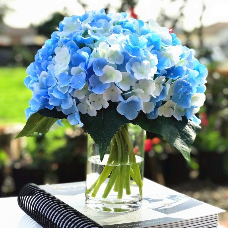 Faux Water Flower Arrangement in Cylindrical Glass Vase, Blue and Cream