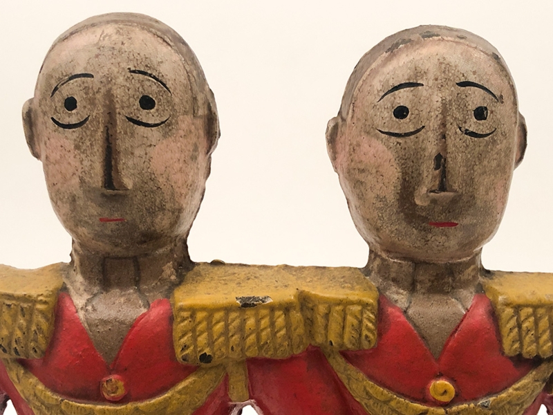 Figural Doorstop Twin Red Tunic Figures Distressed Finish
