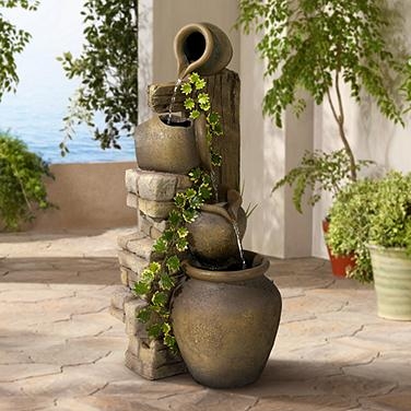 Floor Fountain with Trailing Greenery and Tiered Jug Arrangement