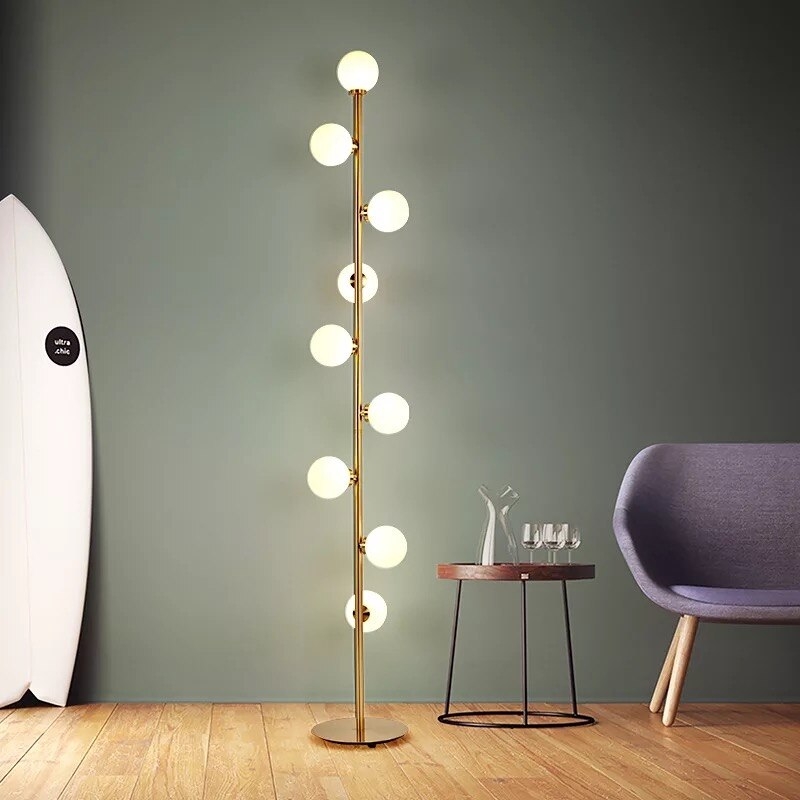 Floor Lamp Staggered Glass Globes on Gold Vertical Stem Nine Light