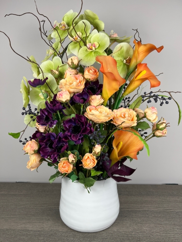 Floral Arrangement: Vibrant Orange Calla Lilies in Ribbed White Vase