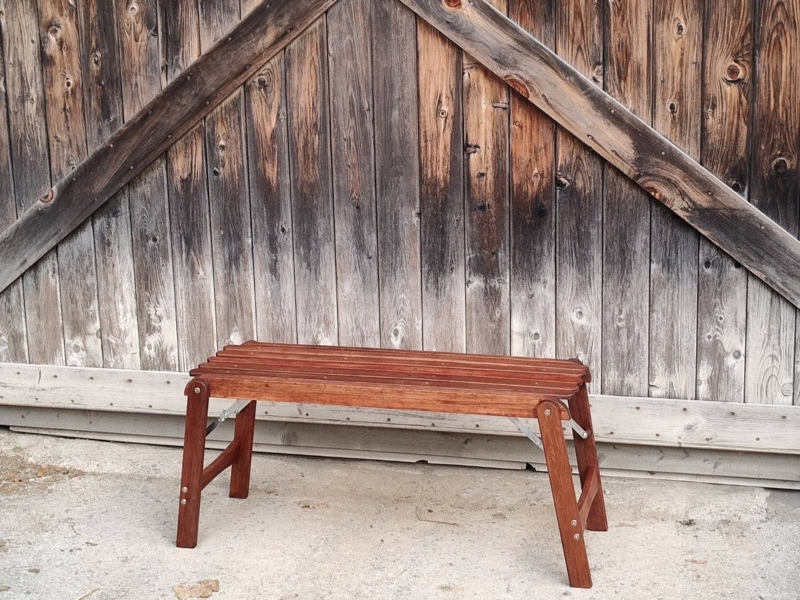 Folding Bench Warm Reddish Brown Slatted Top Exposed Hardware