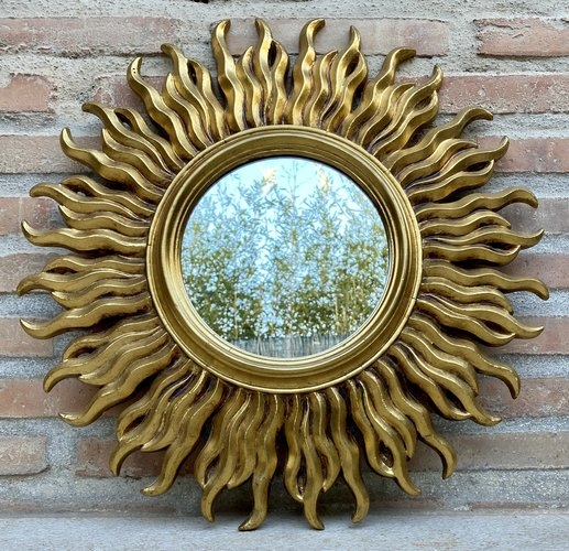 French Gold Sunburst Mirror: Antique Gilded Finish with Wavy Flame Rays