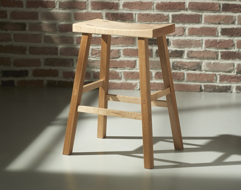 Handcrafted Bar Stool with Figured Maple Grain and Saddle Seat