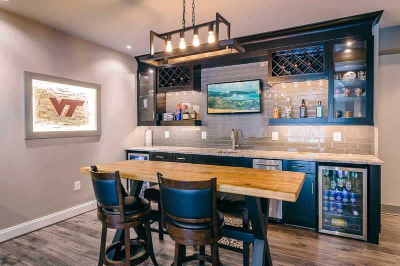 Home Bar Industrial Basement with Backlit Stone Logo & Subway Tile
