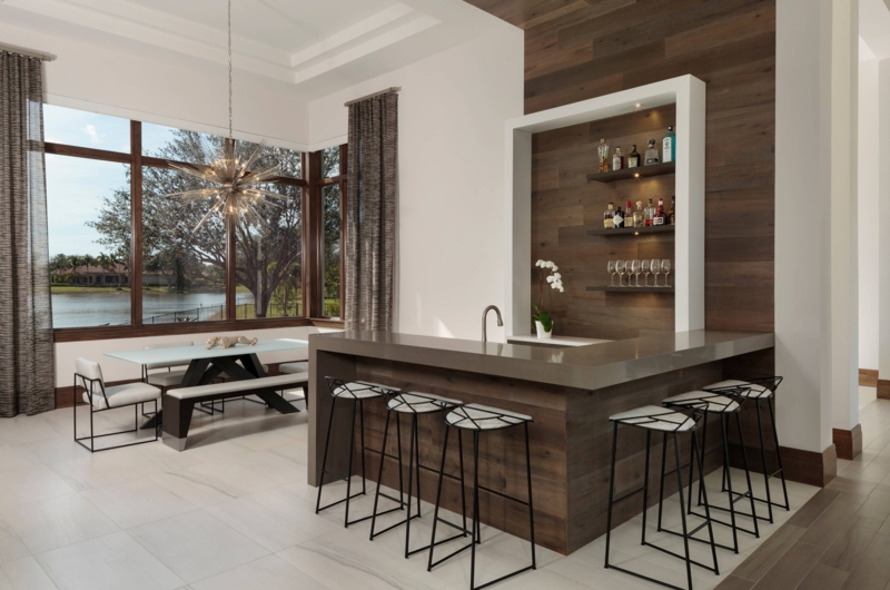 Home Bar with Cantilevered Grey Slab & Walnut Wall Paneling