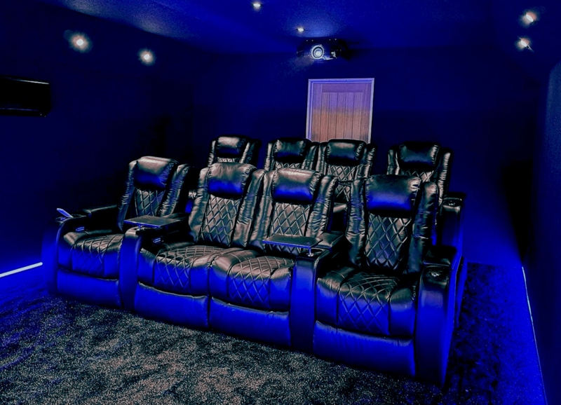 Home Theater Seating Rows with Diamond Quilting & Blue LED Accents