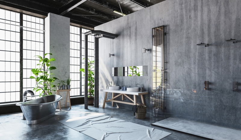 Industrial Bathroom: Metallic Soaking Tub amid Concrete Panel Walls